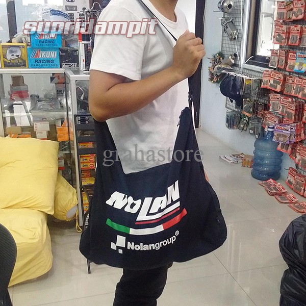 TERLARIS DAN FAST RESPONSE Tas helm bahan tebal halus besar ada tulisan nolan nya