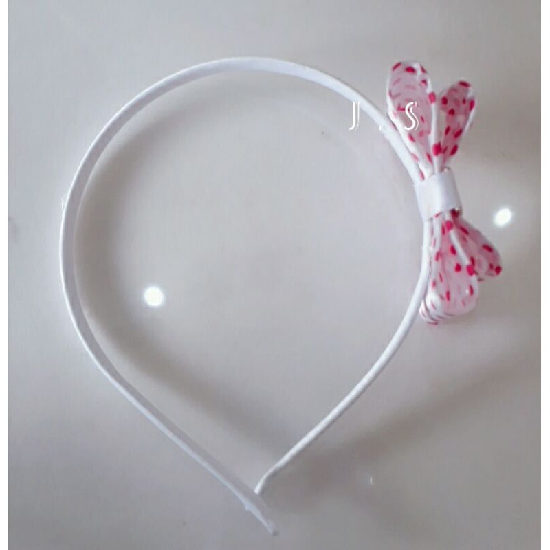 Bando pita kaku motif polkadot