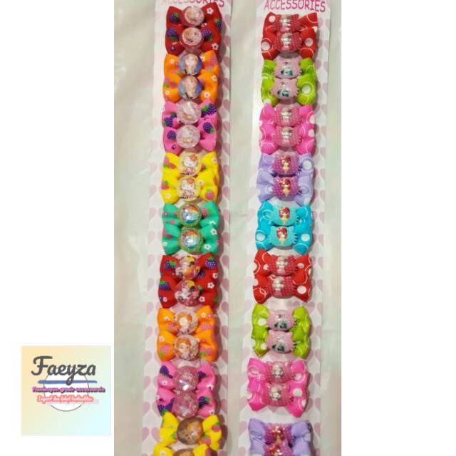 grosir  Jepit pita rambut isi 20 pcs karakter random.