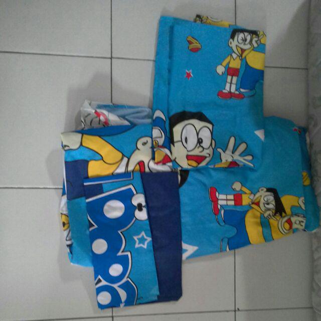 Sprei Katun Motif Nobita Doraemon Blue Lengkap Sarung Bantal Guling Murah