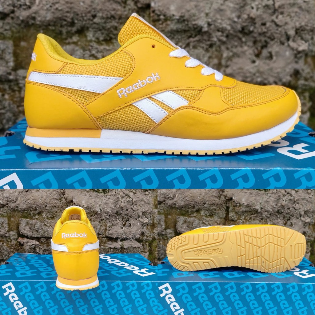 yellow classic reeboks