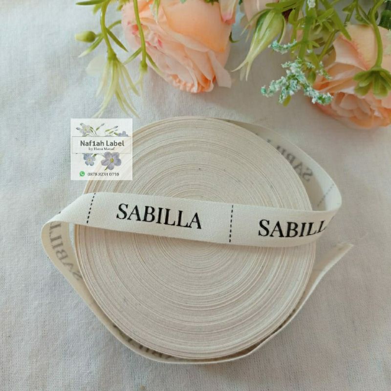 

Label baju katun