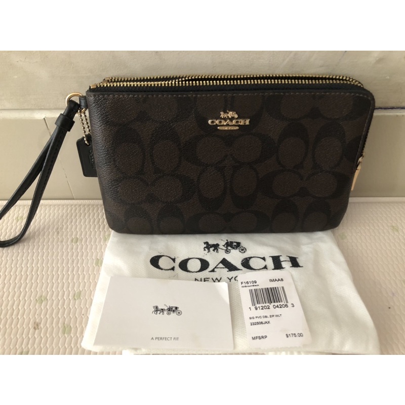 Preloved coach large double corner zip wristlet in signature canvas