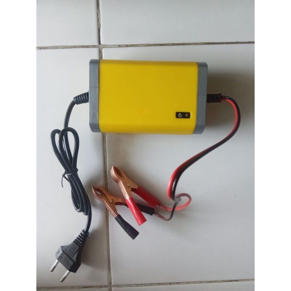 cas aki sepeda motor dan mobil