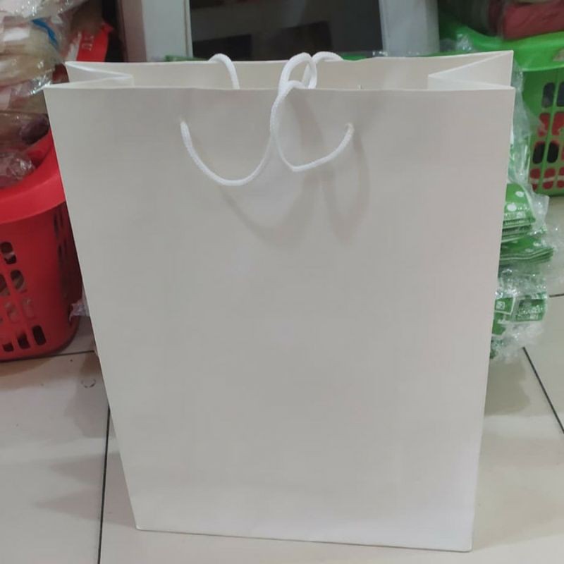 

Paper bag polio warna putih terlaris dan murah isi 12 pcs