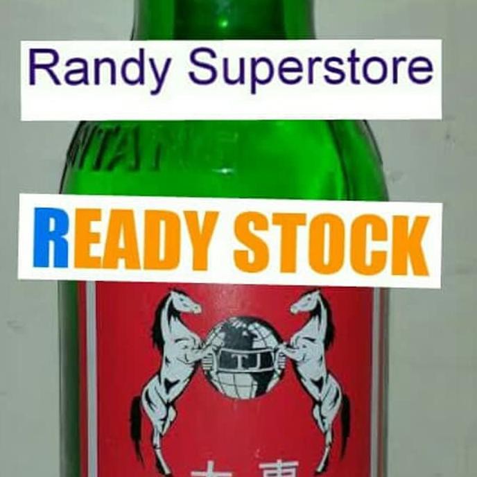 

Arak Putih Sari Tapai Beras Ketan UD. Tai Tong Cap Kuda Merah 600ML