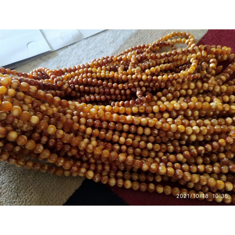 Tasbih kayu damar tasbih kayu pinus tasbih kayu nur asli full getah tembus cahaya