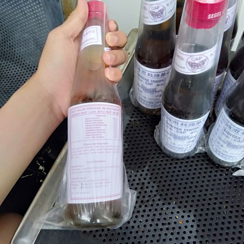 Minyak Tawon asli Makassar 100% Tutup Merah Minyak urut minyak gosok minyak pijat berkhasiat ORI