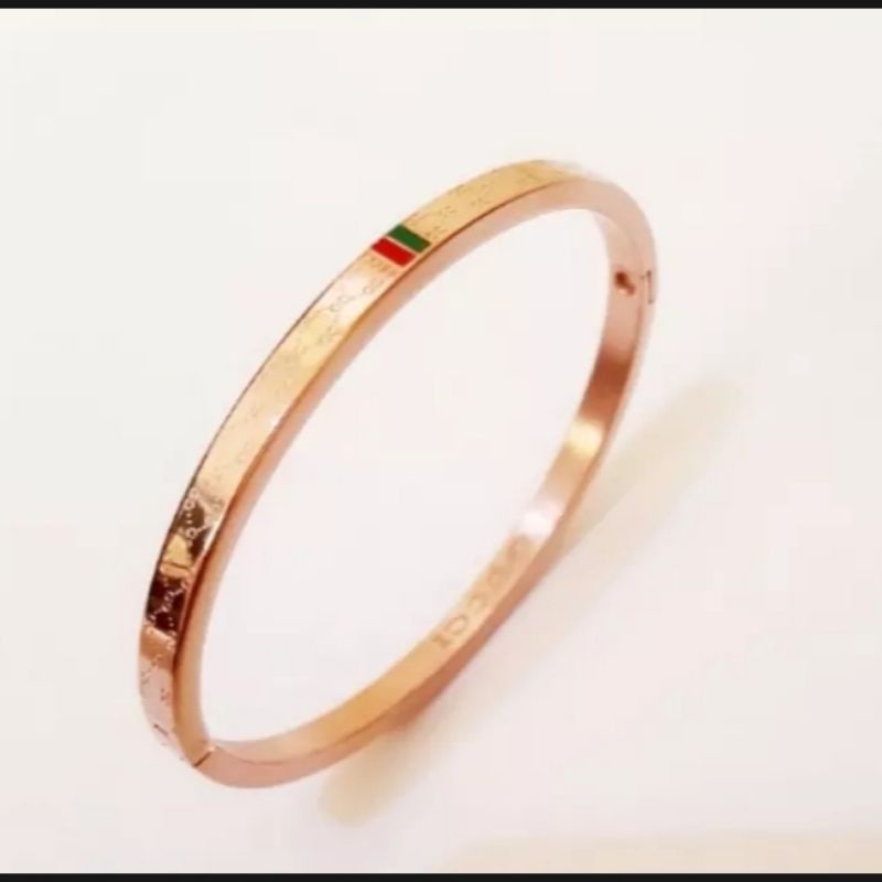 gelang titanium berlapis emas