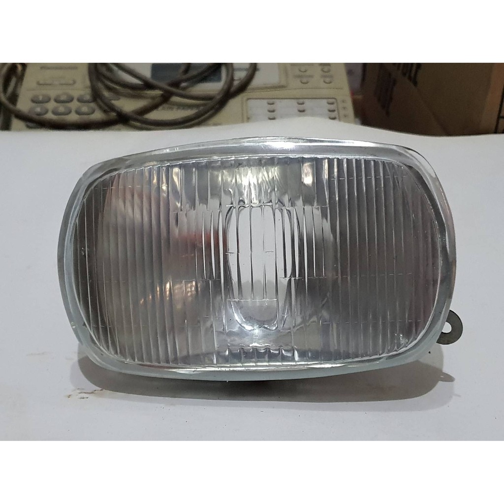 Lampu Depan/Reflektor Vespa P150X Merk Formostar