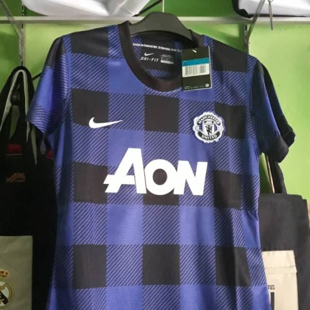 Jersey MU cewek 2012 13