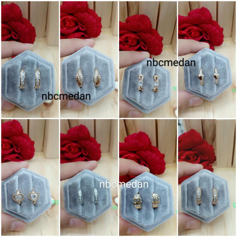 Anting titanium import kode 15 dan salib,awet,tahan lama