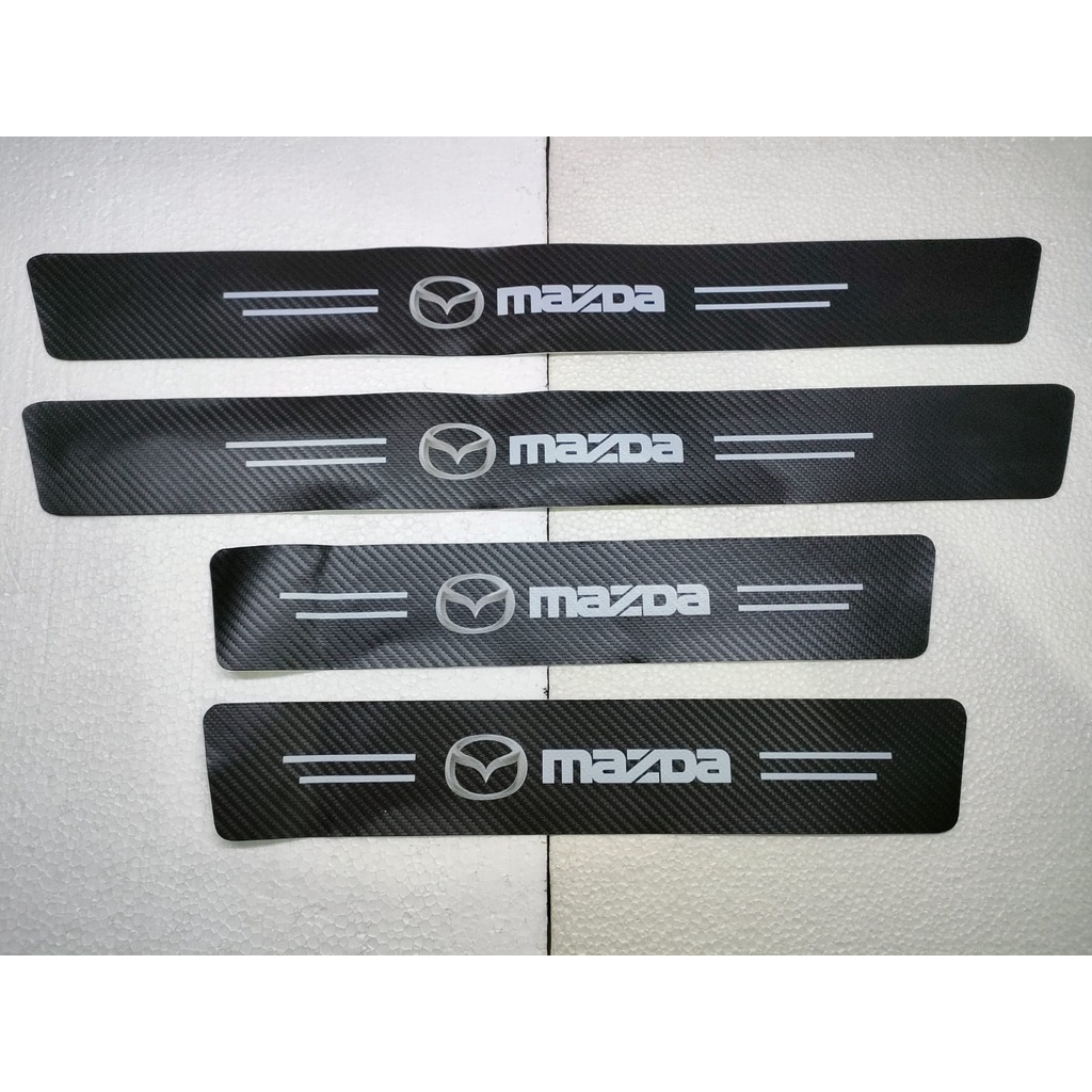 Stiker strip Mazda motif  karbon carbon pelindung pijakan kaki pintu masuk mobil anti gores lecet sticker aksesoris variasi logo merk bisa untuk semua type Mazda 2 3 6 8, Biante, CX-3, CX-5, CX-8, CX-9, CX-30, BT-50 PRO single double kabin hatchback sedan