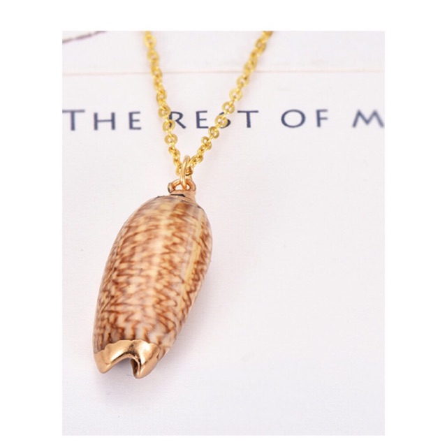 Kalung liontin kulit siput