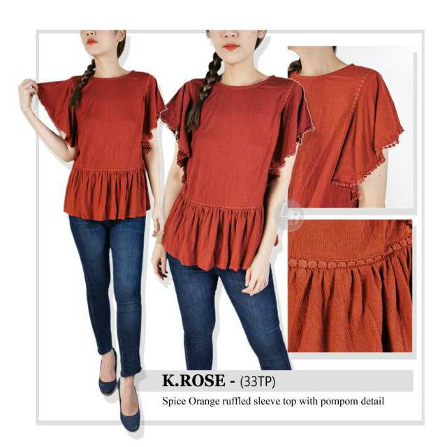 K rose spice orange ruffled top