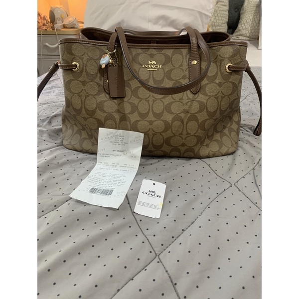 coach drawstring carryall