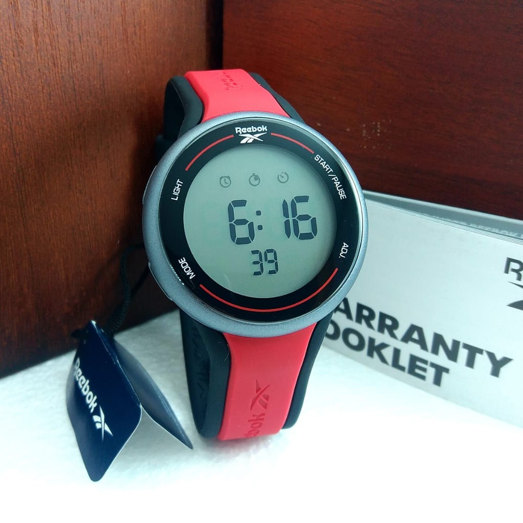 JAM TANGAN UNISEX REEBOK RV-ELG-PSIR-WB BLACK RED RUBBER ORIGINAL