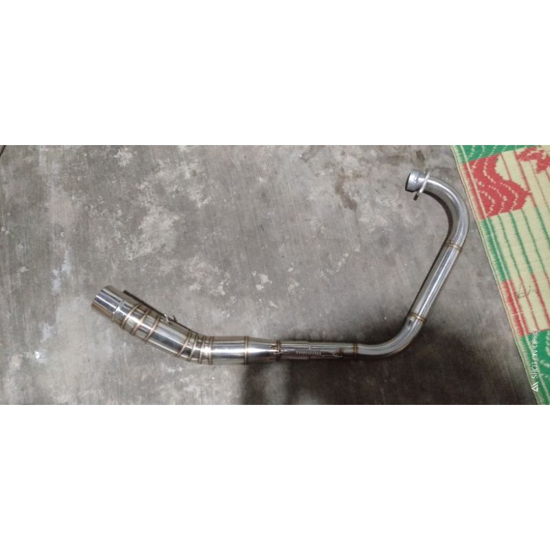 leher header knalpot kolong klx 150 stenlis