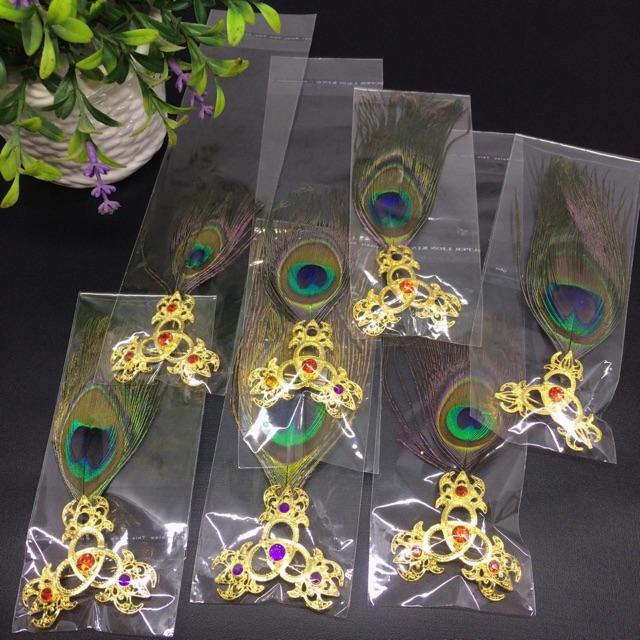 Bros trisula bulu merak alpaka bali