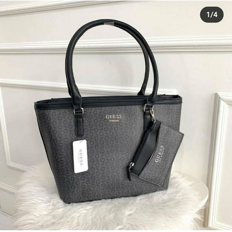 TAS GUESS PREMIUM IMPORT