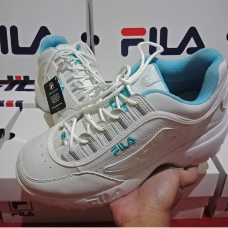 silver fila sneakers