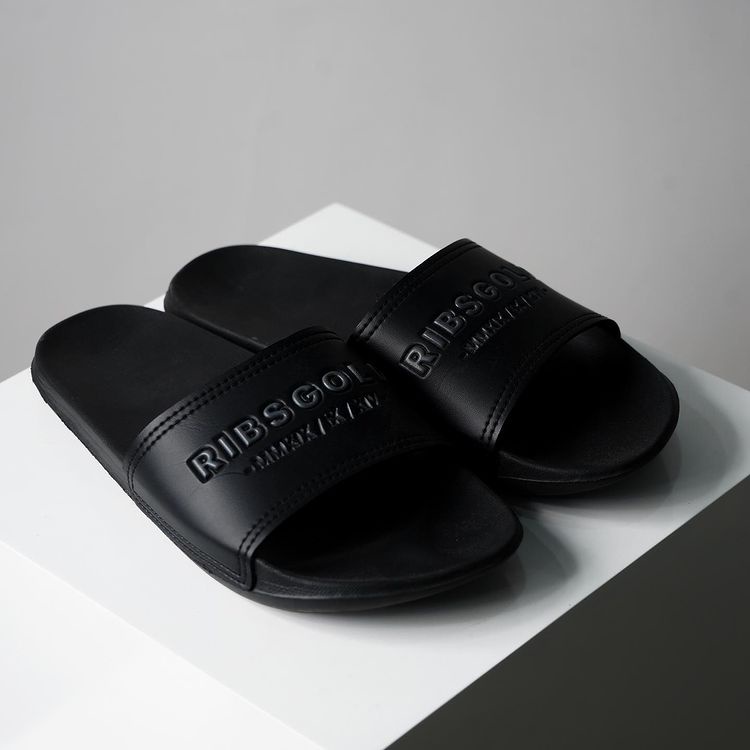 RIBSGOLD Slippers Basic / Sendal Slide Slip On Hitam Pria dan Wanita Kulit Sintetis Premium