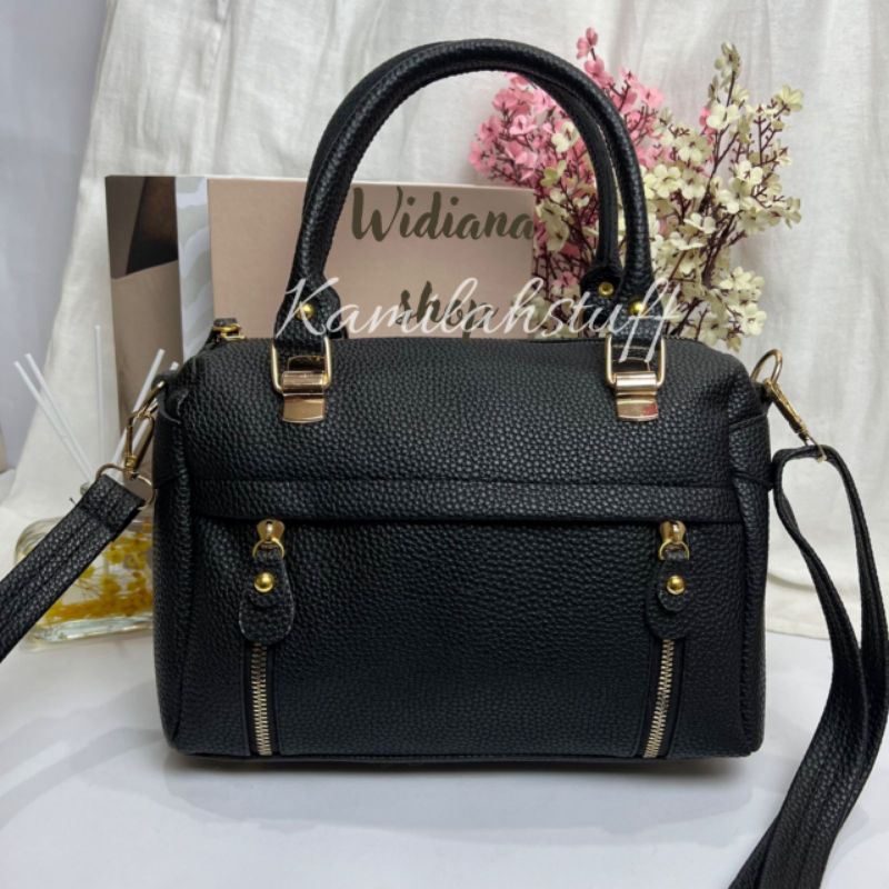 Sling bag wanita princes kulit kulit jeruk sintetis