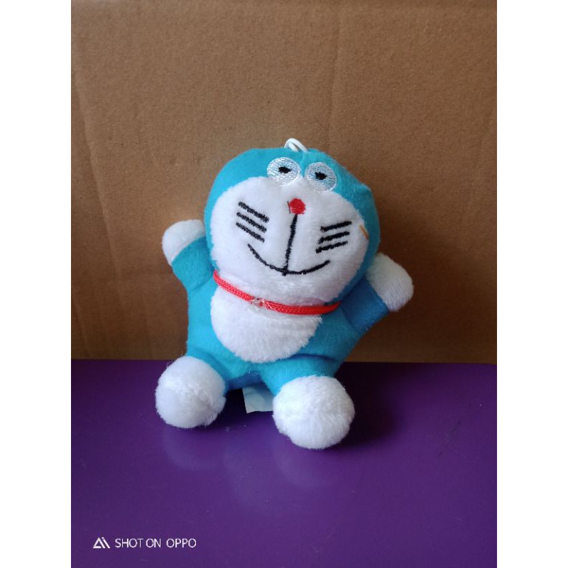 Boneka gantungan tempelan kaca mobil