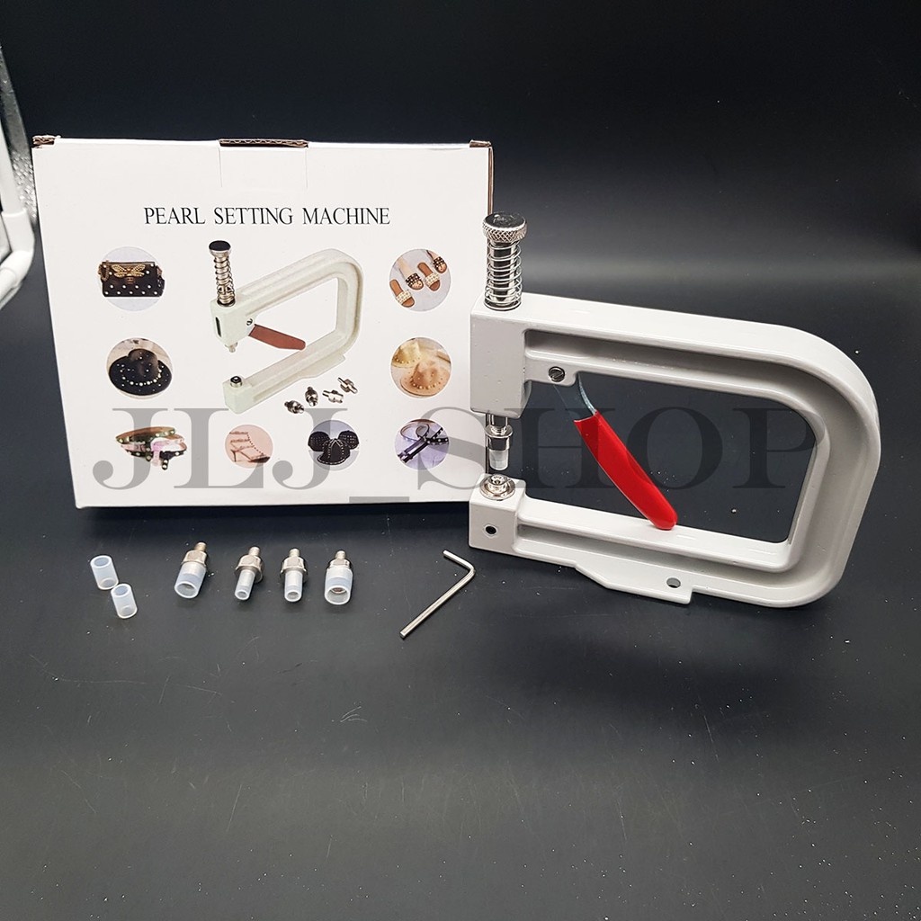 Alat mesin buat pasang atau press mutiara