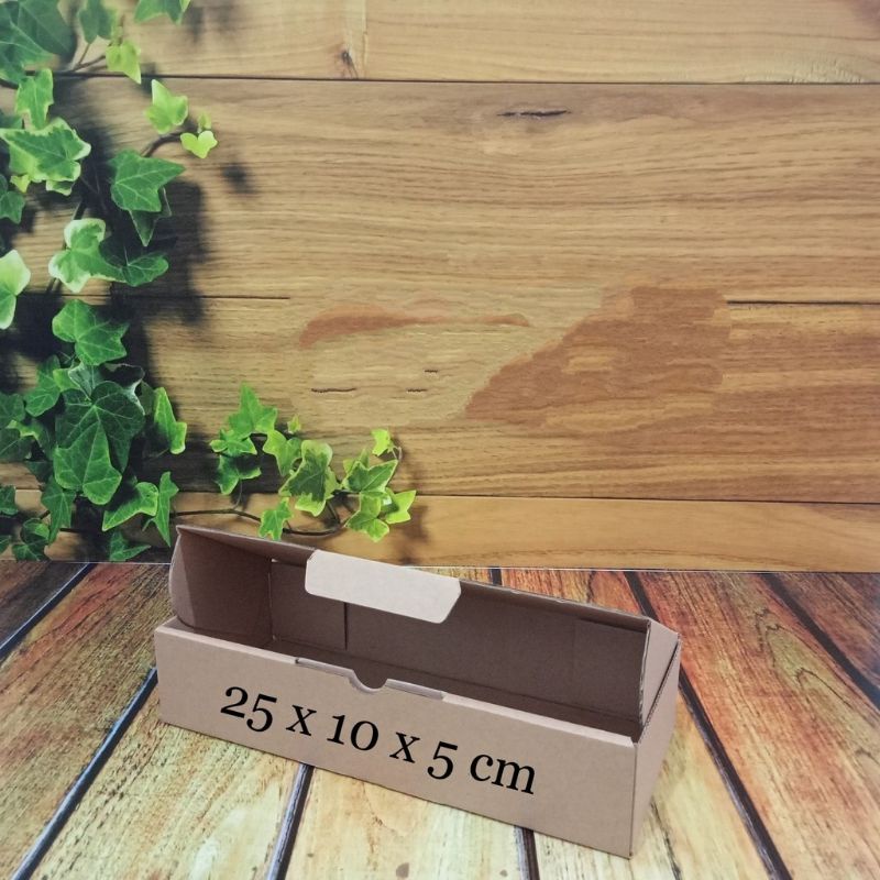 

box/kardus 25x10x5cm...die cut