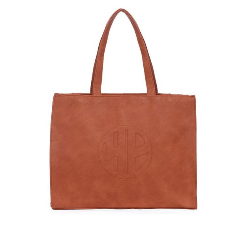 Ivanka L in Orange Hush Puppies Bag