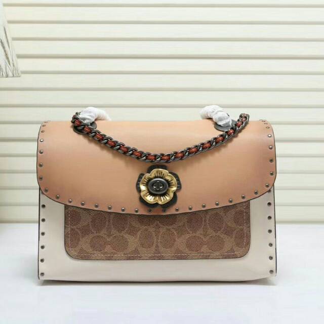 Tas Coach Parker with rivets and snakeskin detail