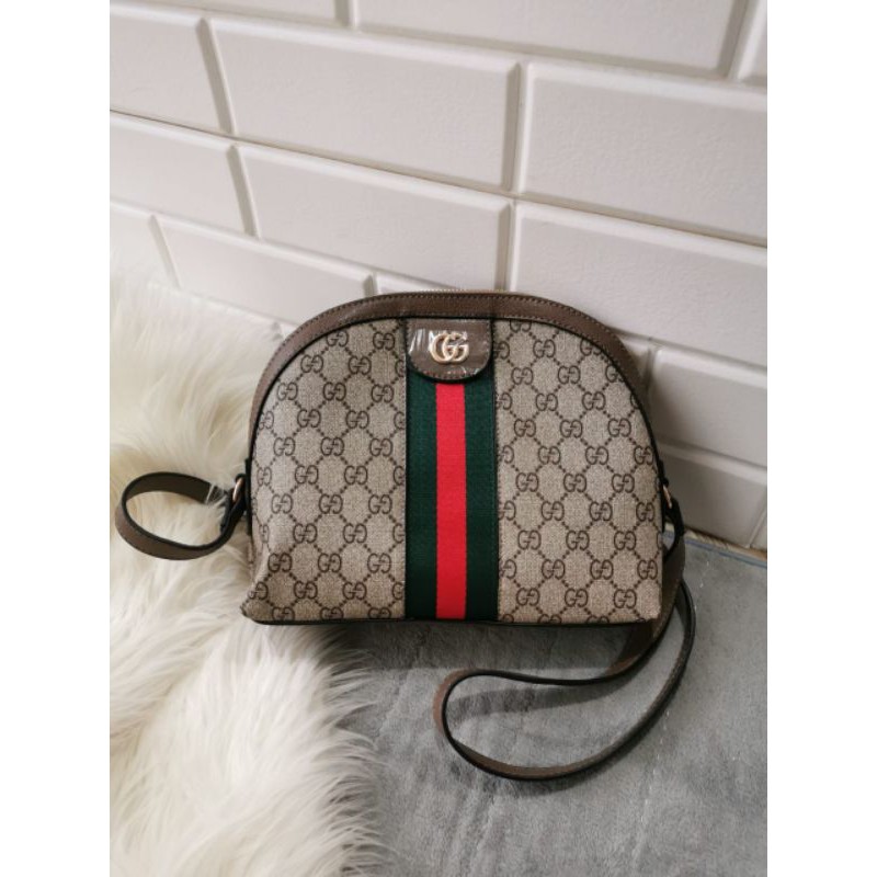 Gucci sling hot sale bag harga