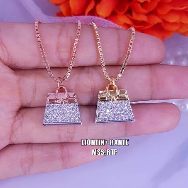 Kalung liontin nikita mirzani ,panjang liontin ±1.2cm titanium , ready semua warna