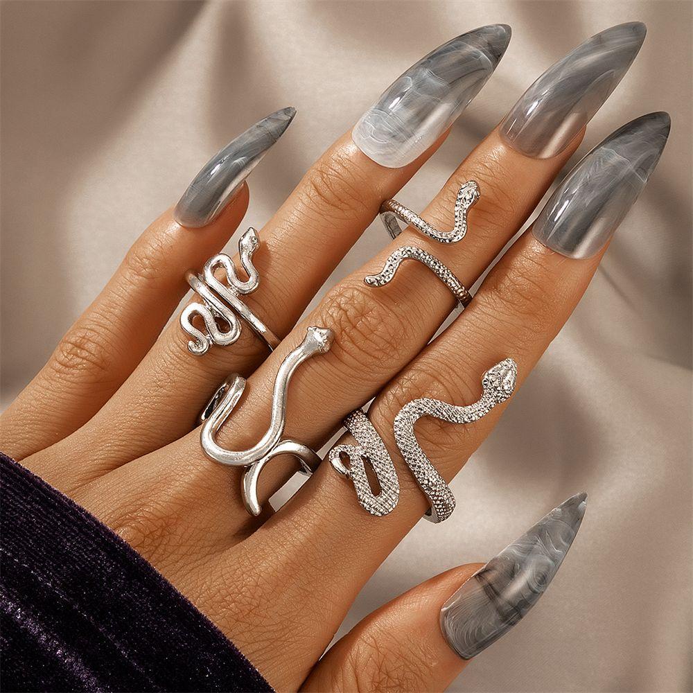 4pcs / Set Cincin Desain Ular Bunga Gaya Vintage Boho Rock Hip Hop Untuk Aksesoris Tangan