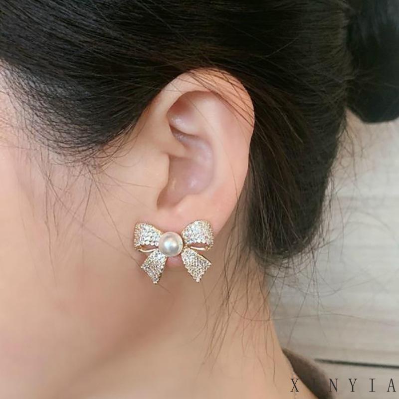 Xia.id Anting Tusuk Gantung Desain Pita Hias Mutiara Gaya Trendy / Simple Untuk Wanita