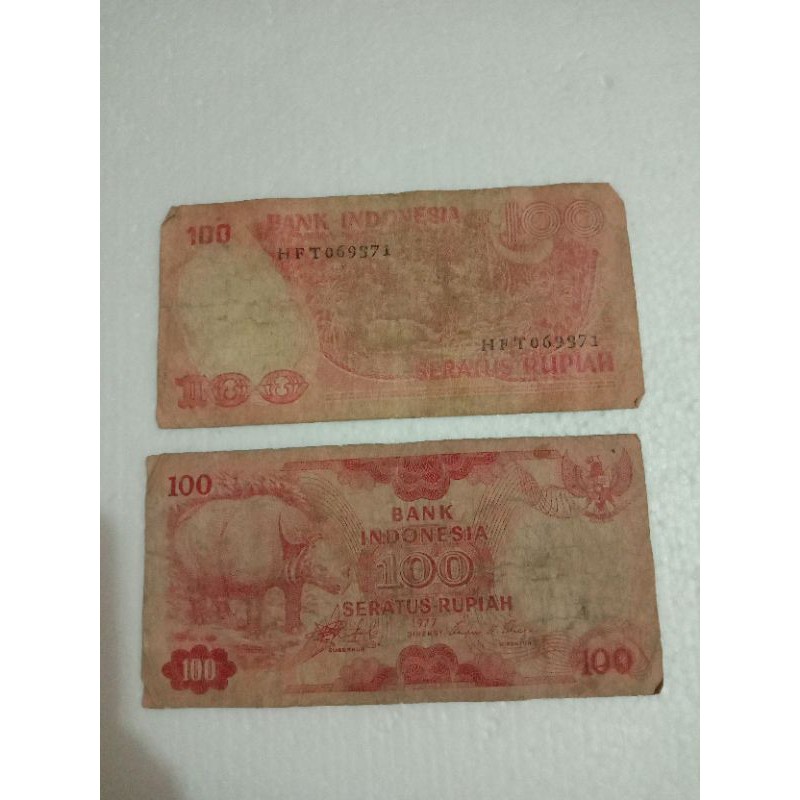 UK01 UANG KUNO NOMINAL SERATUS RUPIAH TAHUN 1977 SERI BADAK JAWA UANG LAMA ASLI INDONESIA