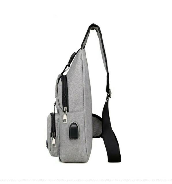 Tas Selempang USB charger HP Best Seller Sling Bag untuk di dada dan bahu IMPOR PREMIUM QUALITY