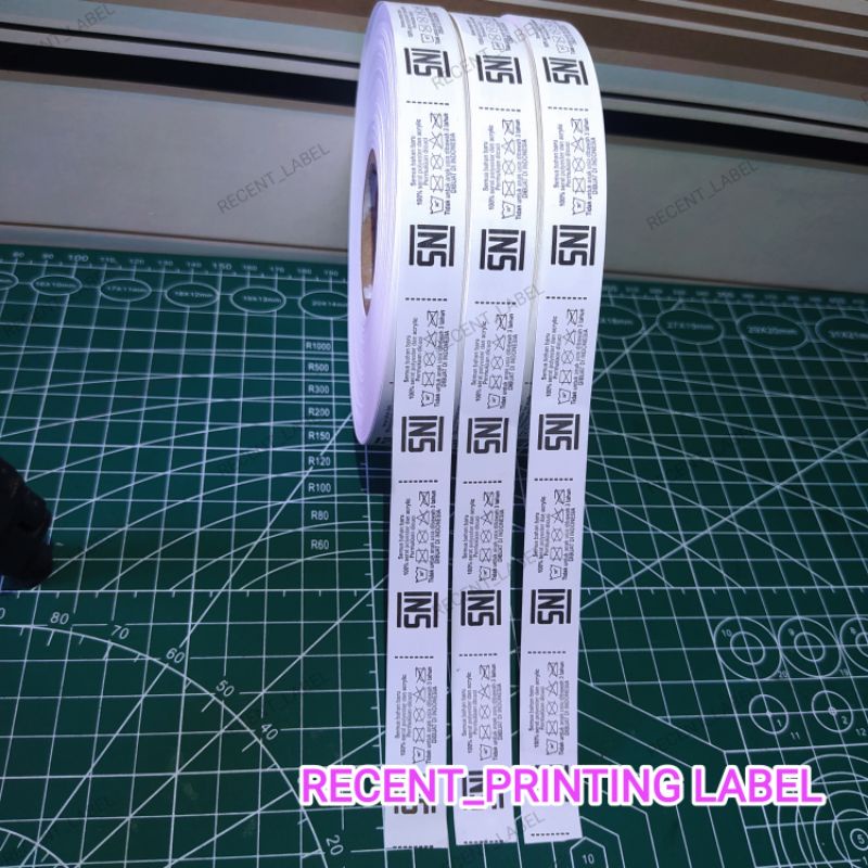 

Printing logo,wash label, SNI label 1.5x4.5cm 1 roll @2.000 pcs