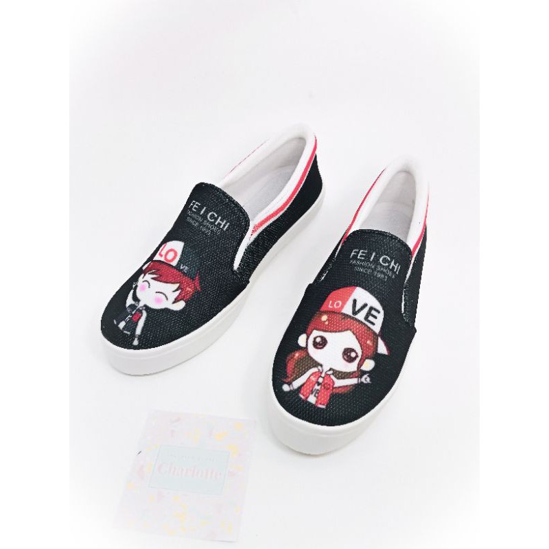 SEPATU WANITA SLIP ON KARAKTER LOVE BOY BEST SELLER MURAH WARNA HITAM DAN PUTIH UKURAN 36-40
