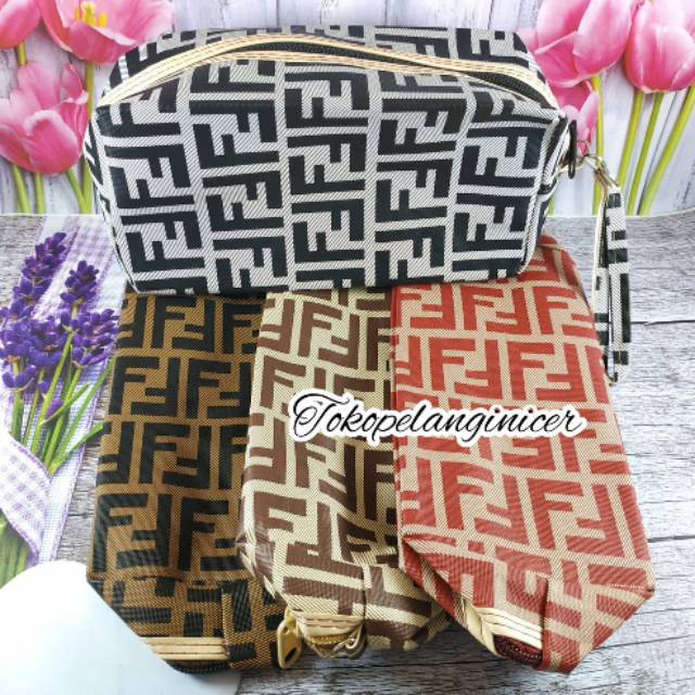 DOMPET KOSMETIK KULIT MOTIF GARIS TOKOPELANGINICER