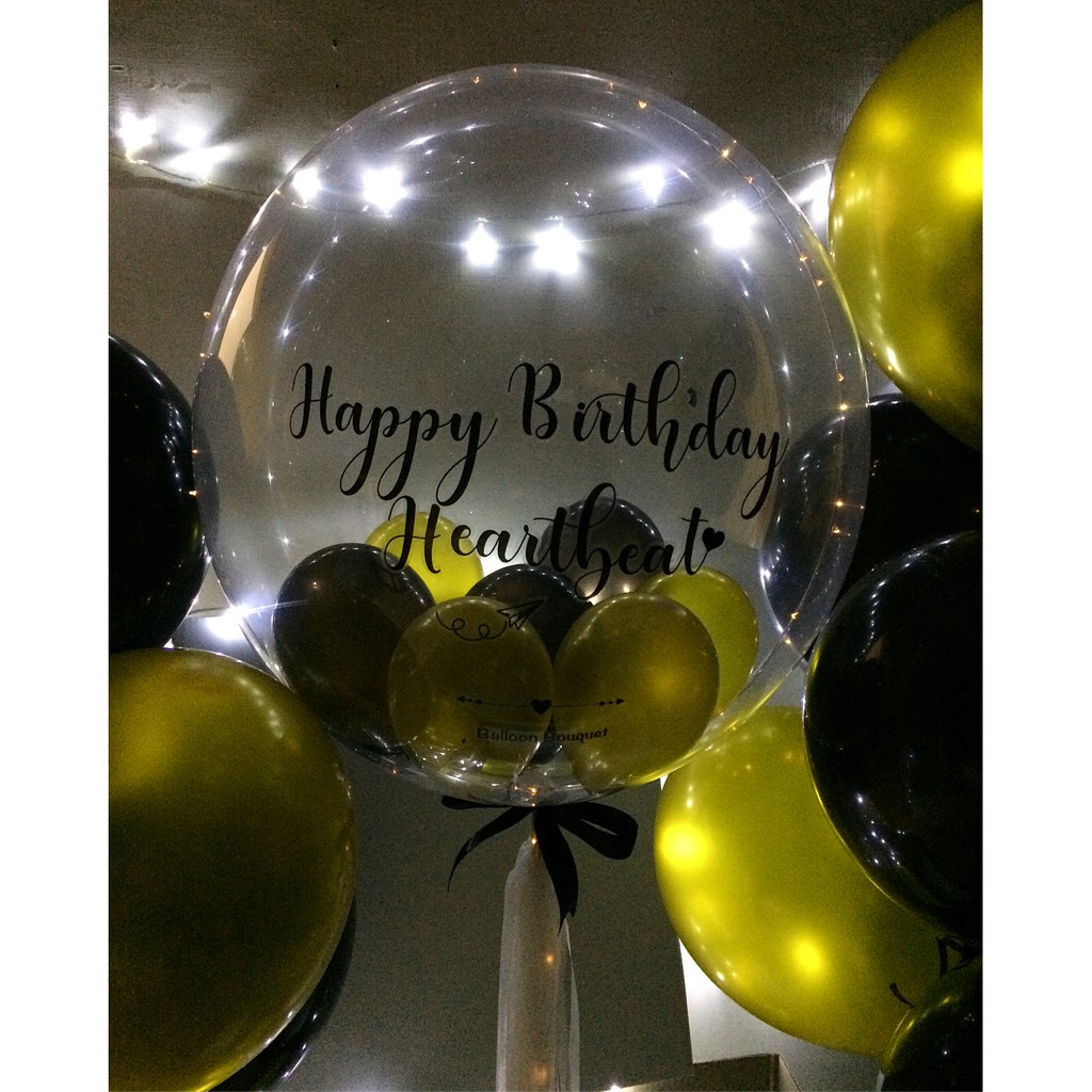 

bubble balloon in black and gold combination