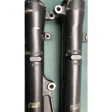 botton shock tabung shock depan tiger revo