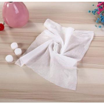 Tissue Handuk Mini Permen Travelling Liburan Kompress Towel Portable