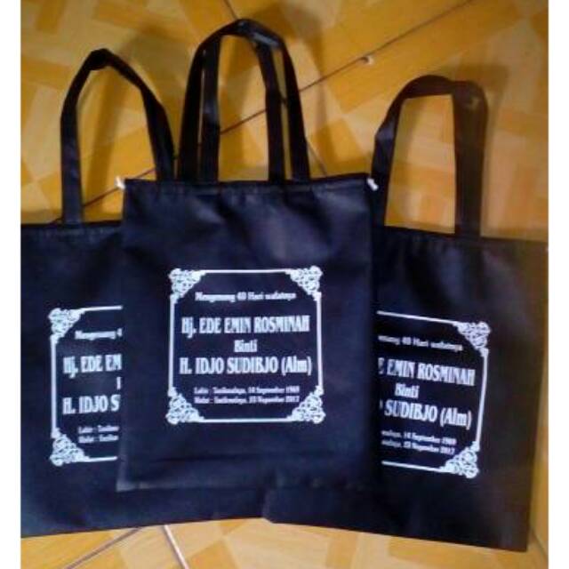 

Pouch serut + tali pegangan bahan spunbond acara tahlil