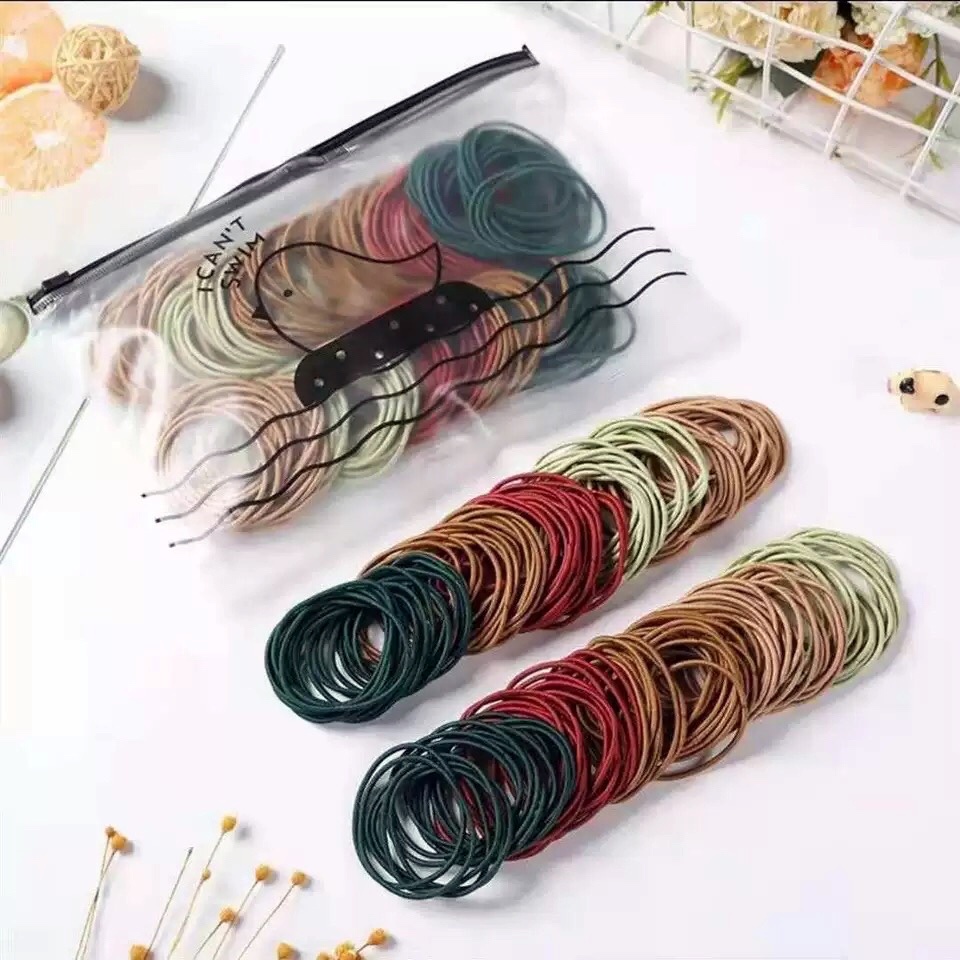 [Fashion Wanita] 100pcs Ikat rambut karet korea tas fashion Karet gelang mulus berkualitas tinggi Harga murah   T024