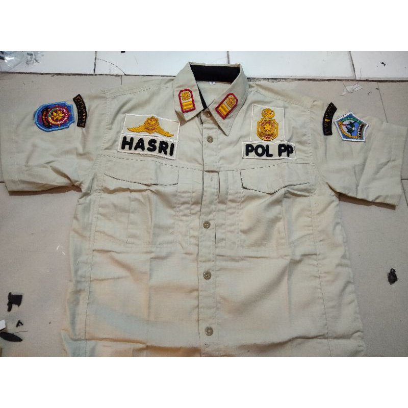 baju krem satgas satpol pp