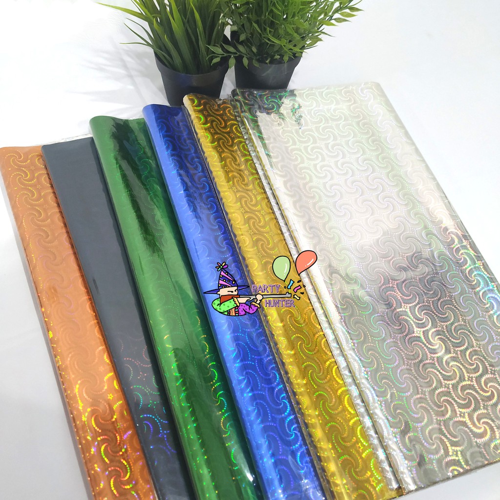

Kertas Kado Hologram Mengkilap 3D Plastik Kilap Motif (5pcs) Tipe 2