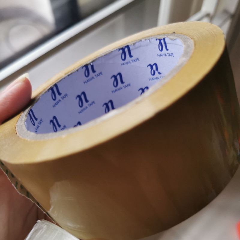 Lakban bening coklat NAWA tape lebar 45mm panjang 90 yard