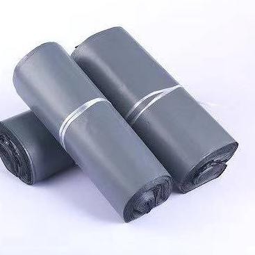 

Best Seller MJN TERMURAH 17x30 HITAM ABU polymailer import TEBAL packing bag bungkus plastik amplop